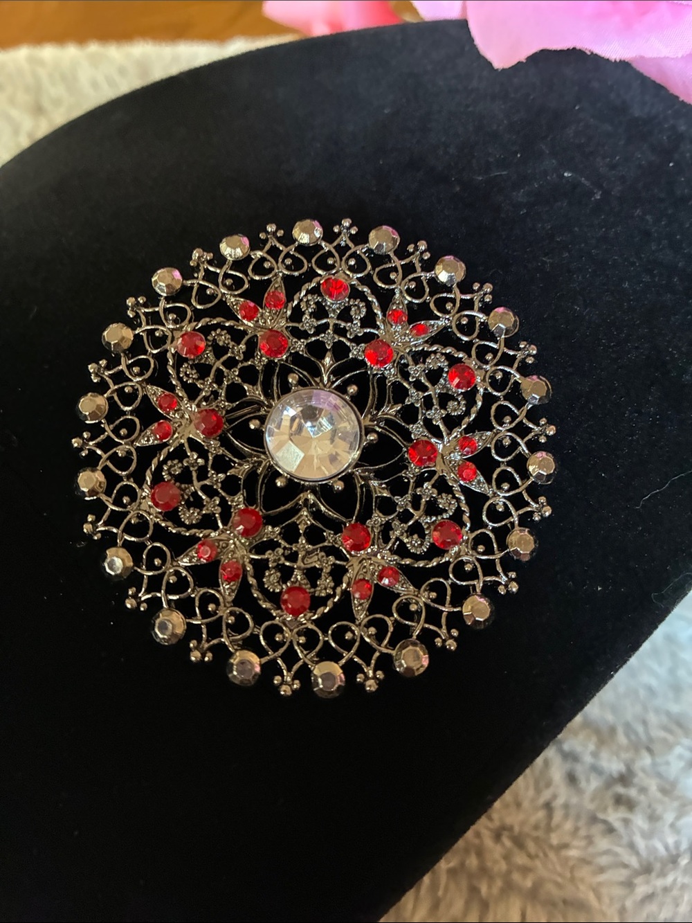 Silver-Tone Filigree Brooch with Red Accents